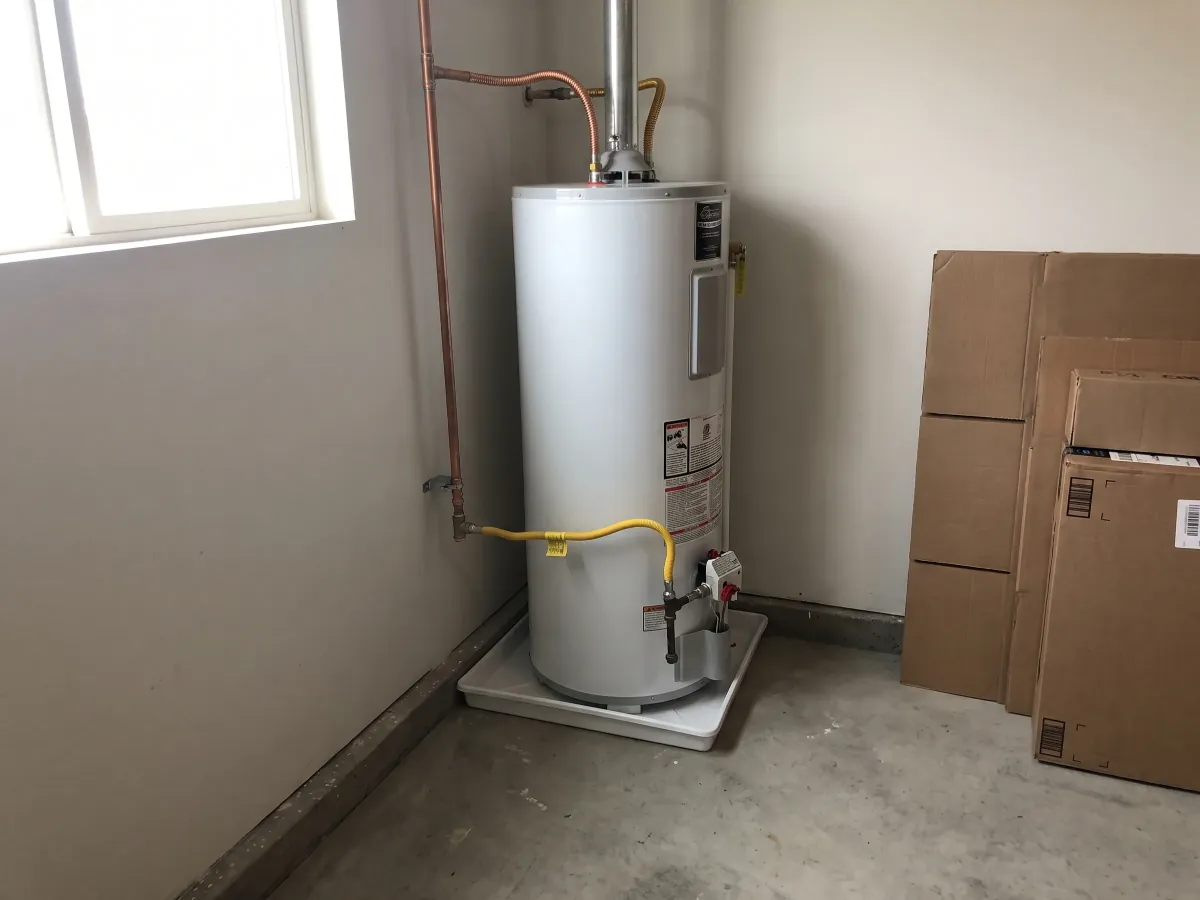New water heater installed with clean copper connections